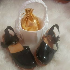 Little girls leather clogs, New Without tags just a little Scratch on right side